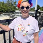 FACSFLA Staff member wearing pride shirt and rainbow hairband