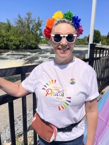 FACSFLA Staff member wearing pride shirt and rainbow hairband